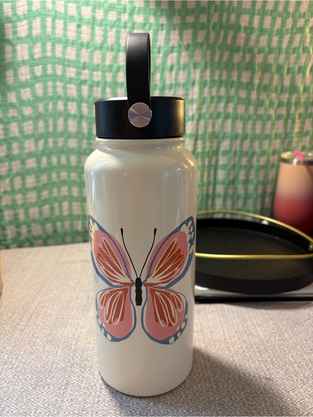 kate spade Water Bottle with Pink and Blue butterfly. Holds 4.5 cups or 36 ozs.